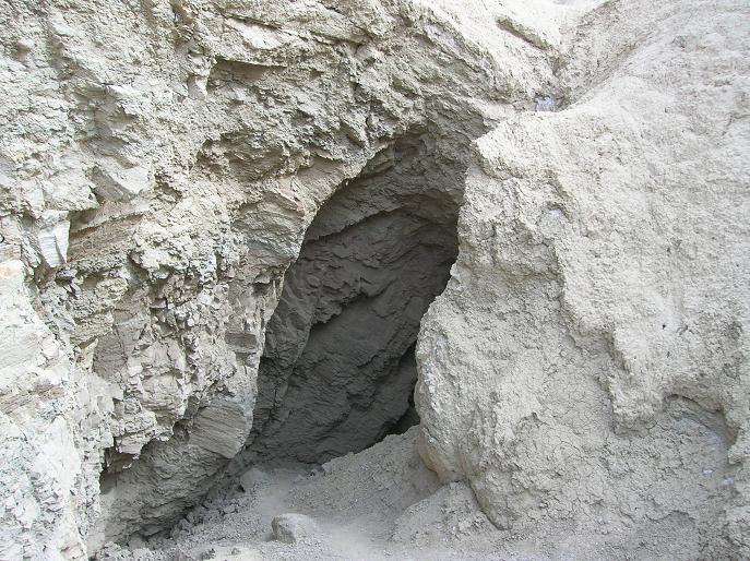 Entrance to mud cave in the desert