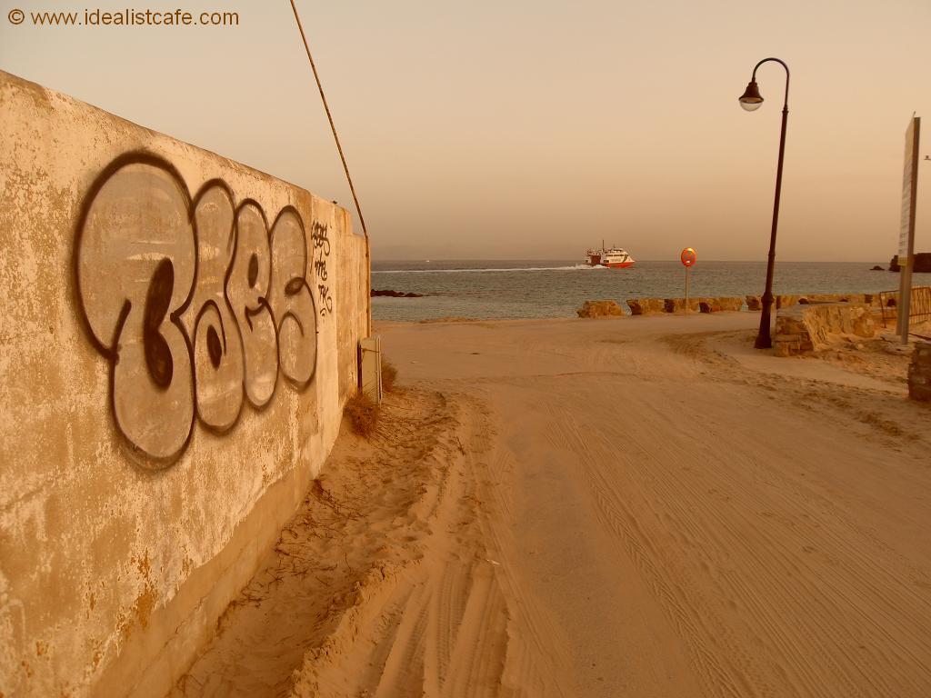 Tarifa, Spain sunset and graffiti, looking towards Africa