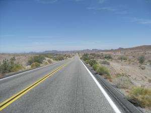 Riding on the long open desert road, Arizona