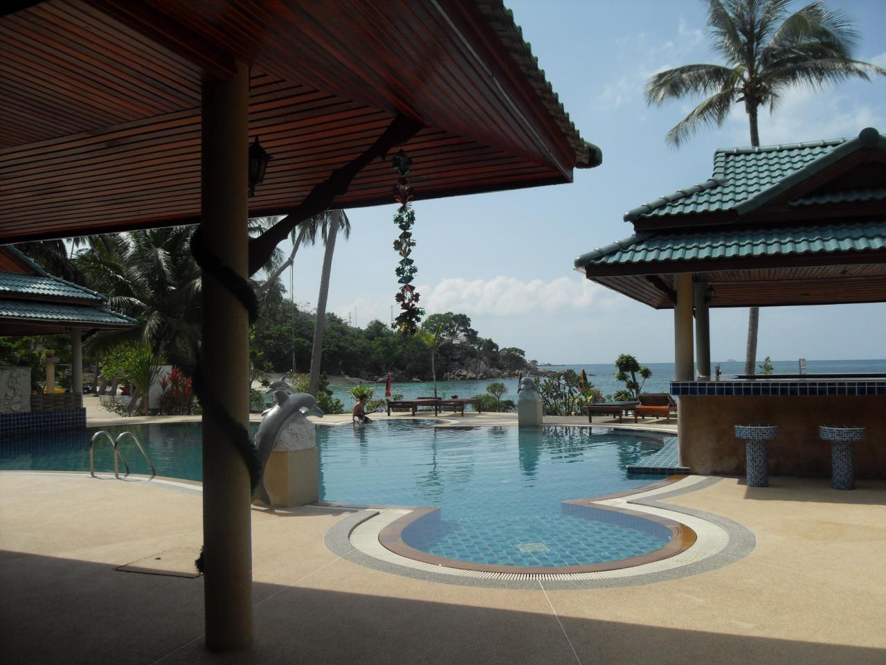 Sitting in restaurant, looking at pool and ocean